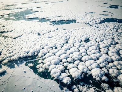 Cloud deck from above showing texture like frozen ocean surface