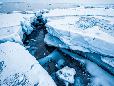 Crevasse bridge showing thin ice over void