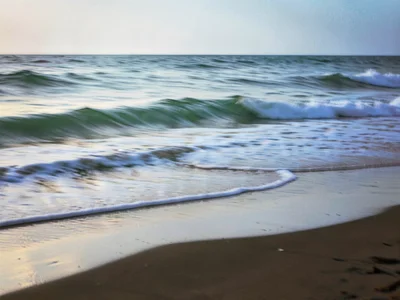 Reflection blur on wet sand