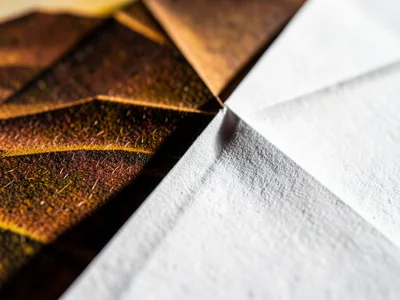 Origami paper before folding: extreme macro of factory-printed color on one side