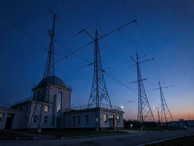 Antenna array against deep blue evening sky