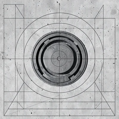 Circular manhole cover on concrete, concentric ring geometry, top-down view