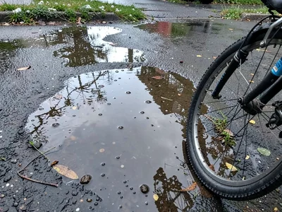 Rain puddle with bicycle