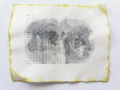 Thermal paper edge yellowing, chemical coating changing color from age exposure,