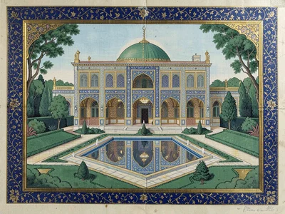 Palace facade viewed from a formal garden with a geometric reflecting pool
