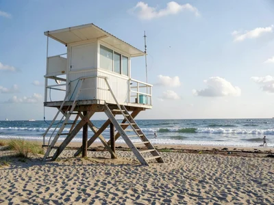 Beach scene with lifeguard tower