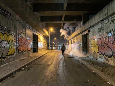 Graffiti underpass at night