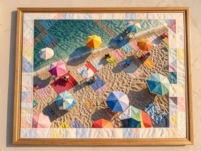 Aerial view of beach with colorful towels and umbrellas, geometric pattern from 