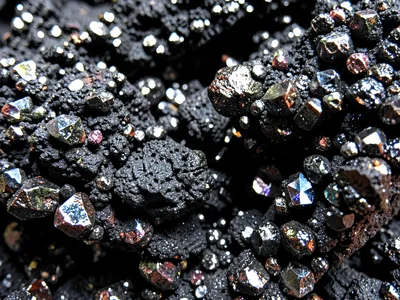 Volcanic cinder texture with metallic sheen