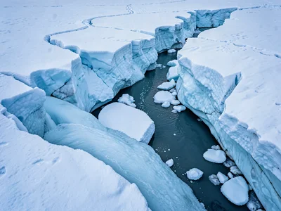 Meltwater stream cutting ice channel