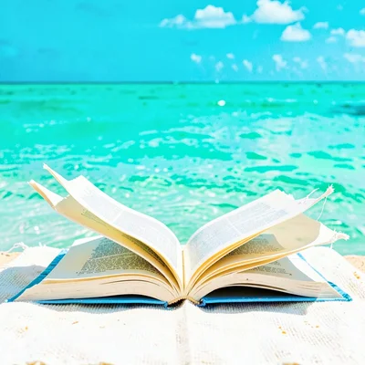 Expansive turquoise negative space, bleached whites, An open book face-down on a