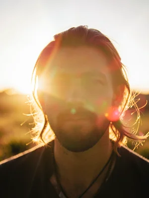 Portrait into sun with flare