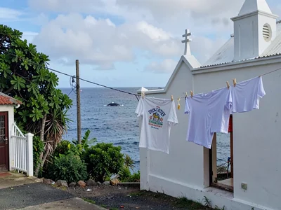 Sunday stillness in Nuku'alofa, Tonga, Sunday white clothes drying on a line, oc
