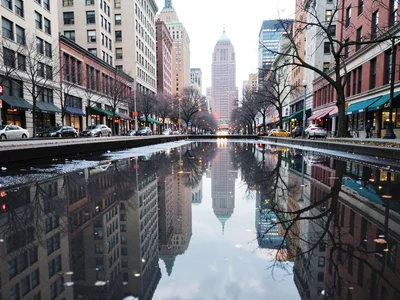 Puddle with city reflection