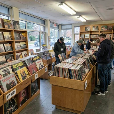 Record store vinyl browsing