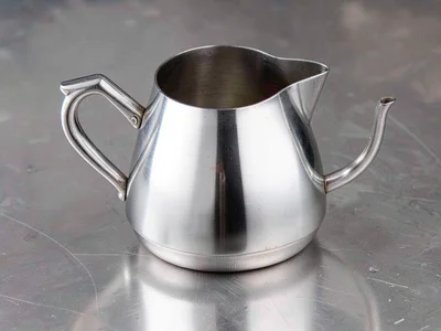 Silver coffee pot belly curve