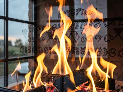 Fire reflection in window glass overlay