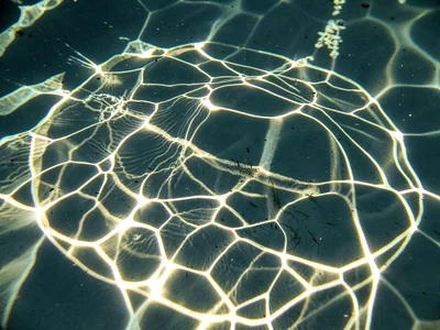 Active caustic from ripple surface
