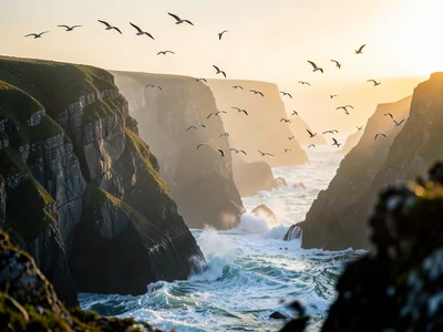 Rocky coastal cliffs with waves crashing below, seabirds circling in fog