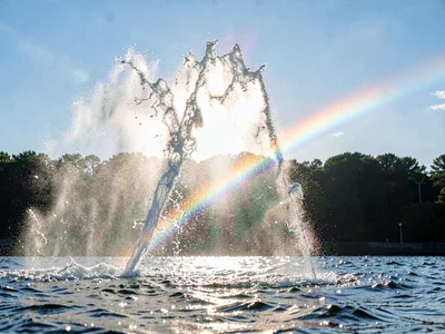 Spectrum visible in water spray backlit by sun