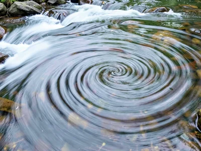 Eddy spiral pattern in silky water