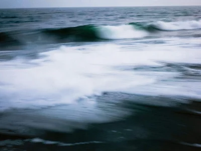 Fog and wave blur merging seamlessly