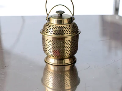 Brass lantern with perforated patterns