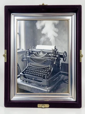 A vintage linotype machine with its magazine of brass matrices and molten lead p