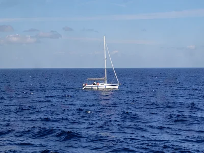 Single boat on vast sea