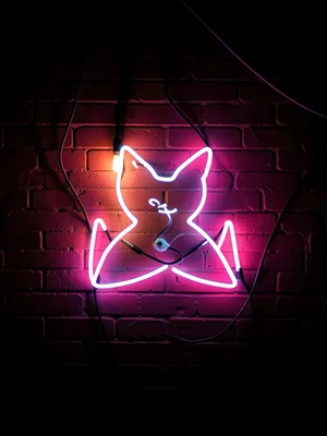 Figure under neon sign