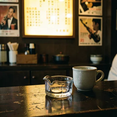 Glass Ashtray and Empty Cup