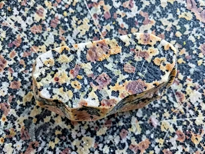 Granite erratic showing glacial polish and scratches