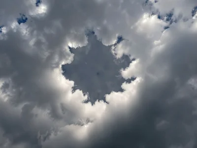 Hole-punch cloud creating circular gap in stratocumulus deck