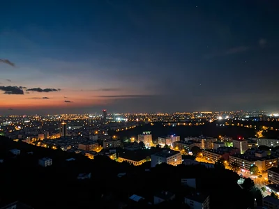 Distant city glow under twilight sky