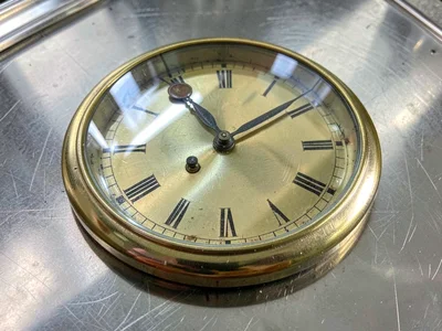 Brass clock face detailed