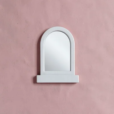 Blockcolor catalog motif of a vanity mirror as a small flat shape on dusty rose 
