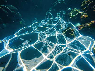Pool floor dancing with refraction