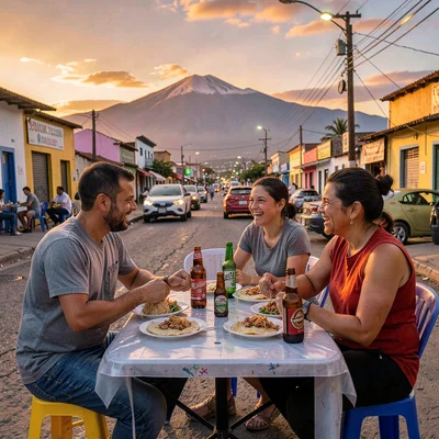 Pupusería golden hour in El Salvador, Friends sharing pupusas at a plastic table