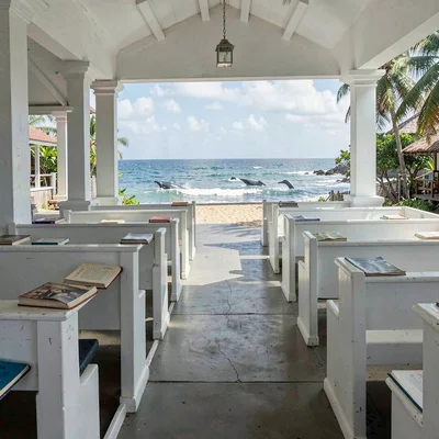 Sunday stillness in Nuku'alofa, Tonga, Sunday hymn books resting on white church