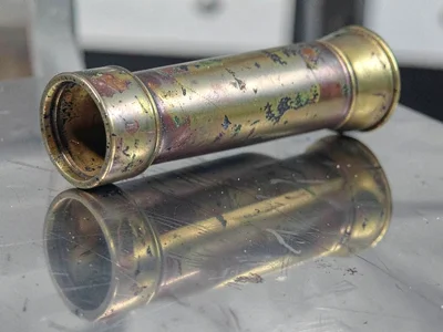 Brass telescope with aged patina