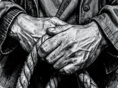 Weathered hands gripping rope