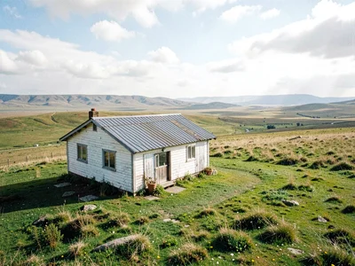 Small house in vast landscape