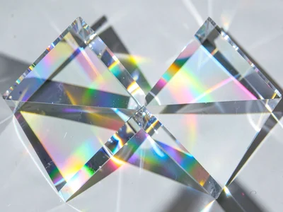 Multiple prisms creating spectral intersection