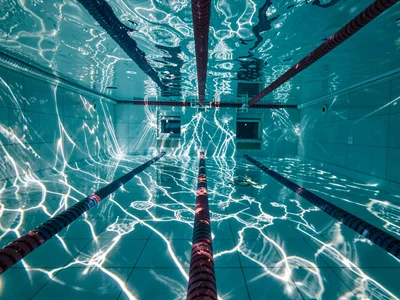 Pool lane markers through caustic