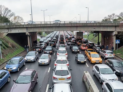 Traffic jam seen from overpass, cars filling frame