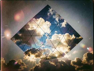 Geodesic dome wireframe overlaid on cloud formations, triangular facets filled w
