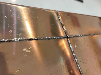 Copper still showing soldered seams