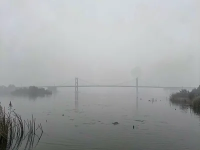 Bridge disappearing in smog