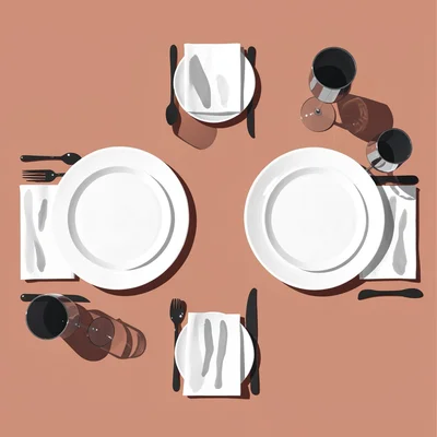 Overhead shot of a dinner table set for two, napkins and glasses as flat shapes