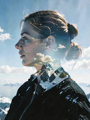 Mountaineer's profile merged with summit, becoming the thing she conquered, ice 